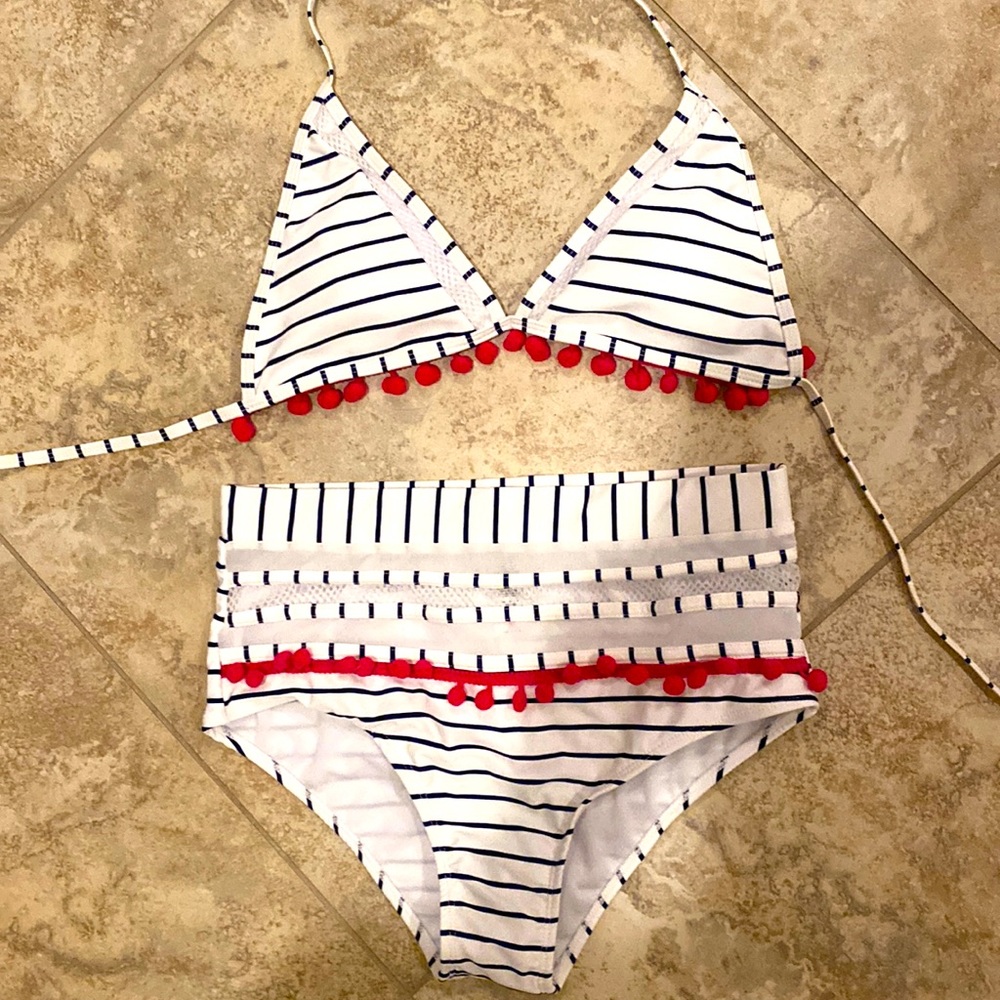 Brand new, no tags but with panty liner. Bought on Amazon a few years ago
